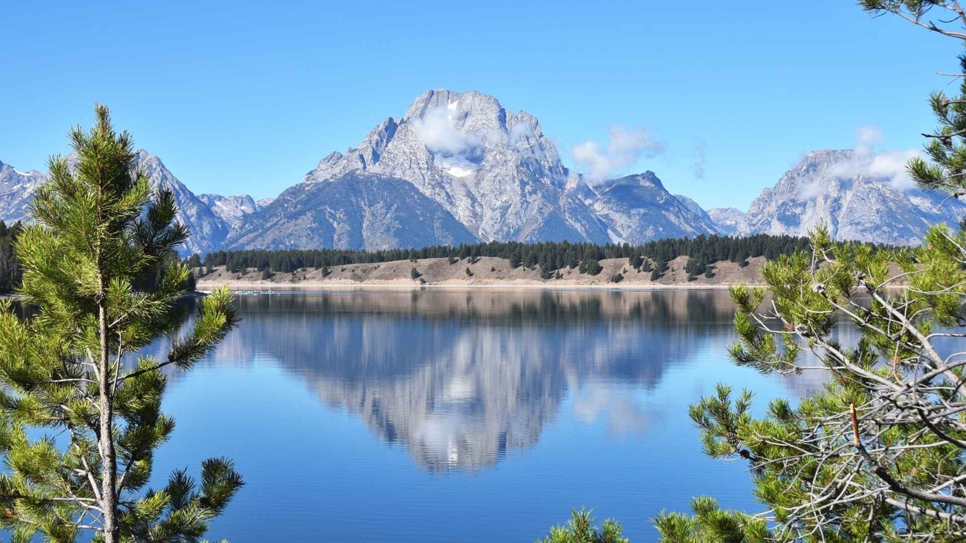 A photo of a lake and mountains