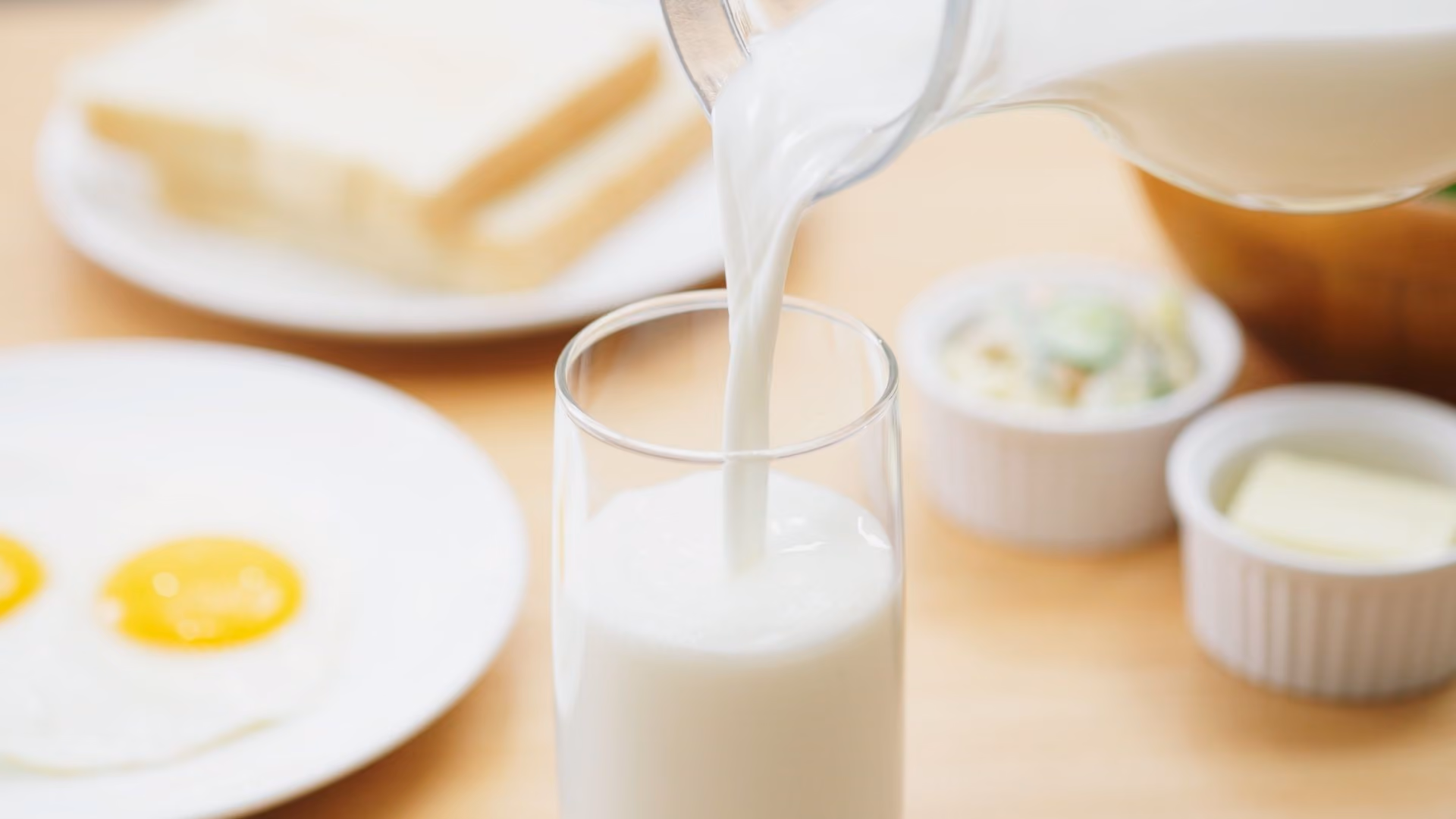 A glass of milk on a table