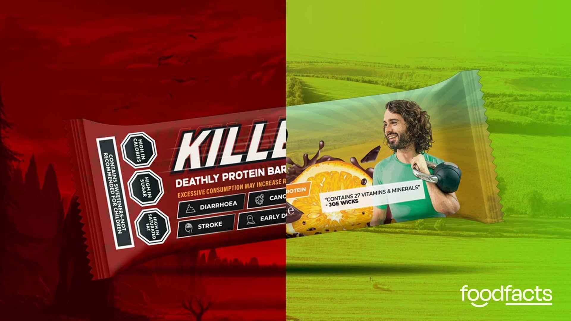 Joe Wicks holds two of his killer bars, one in each hand