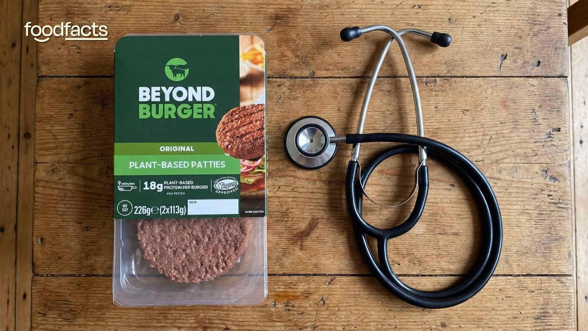 A packet of Beyond Burgers sits next to a pair of stethoscopes