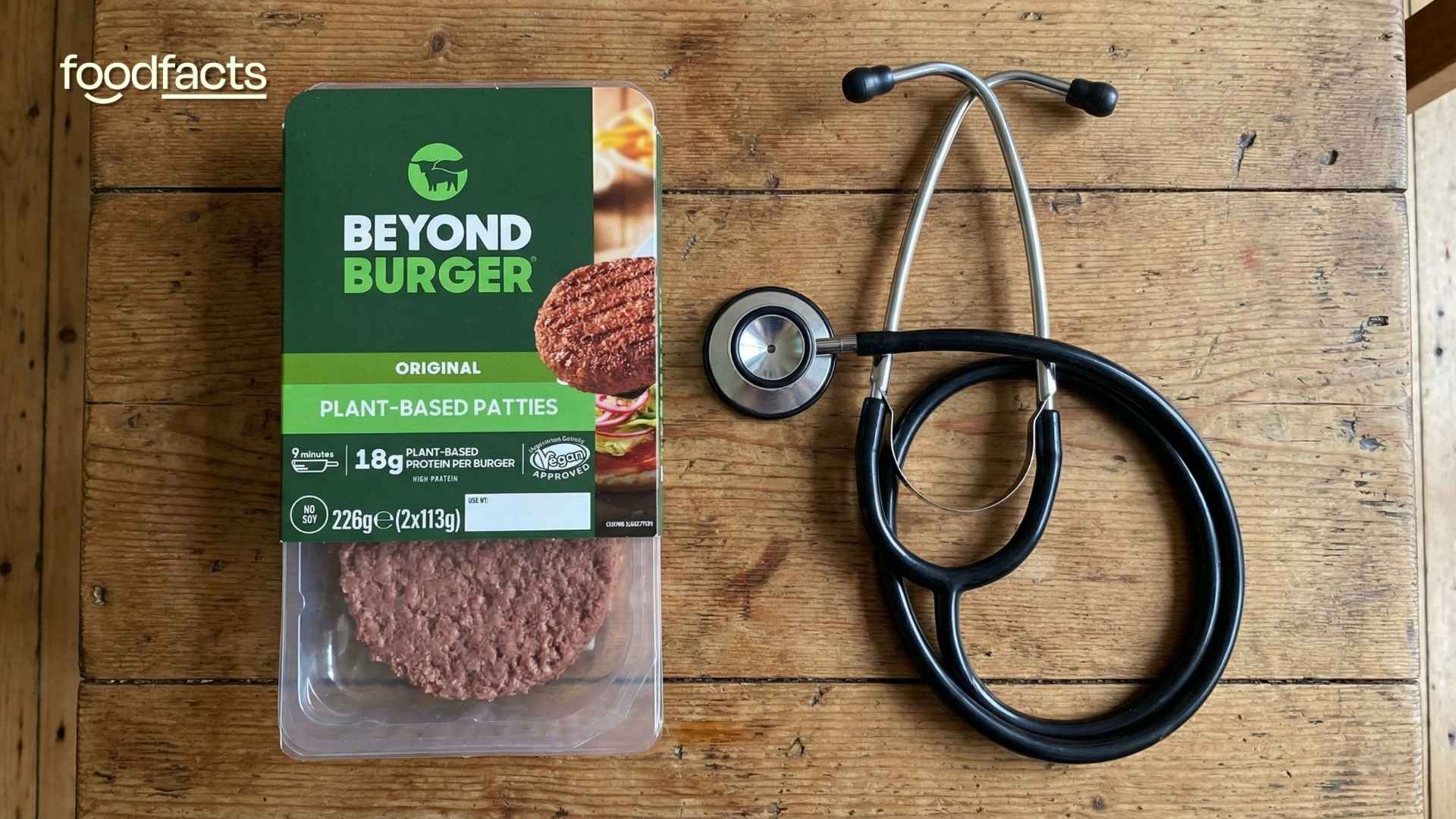 A packet of Beyond Burgers sits next to a pair of stethoscopes