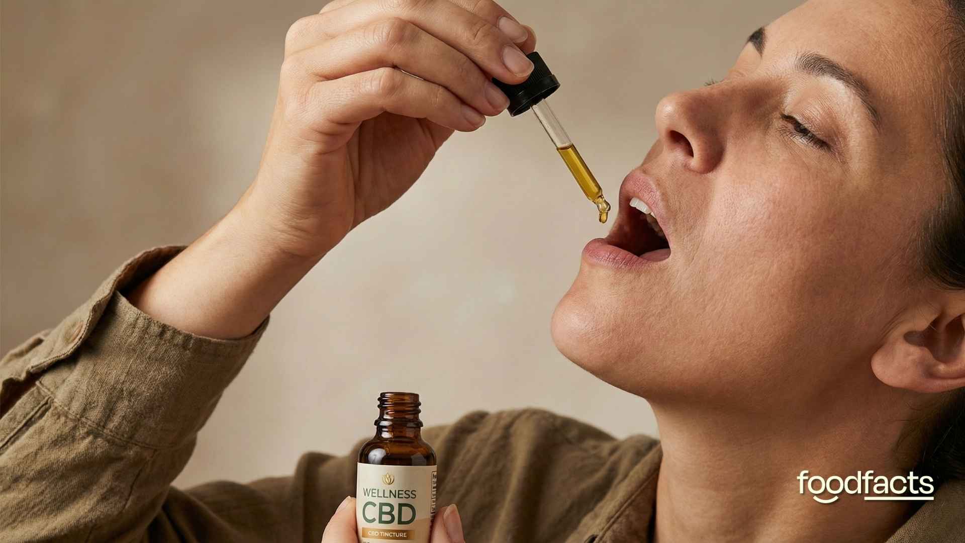 A person holds a bag of cbd flowers and a bottle of cbd drops