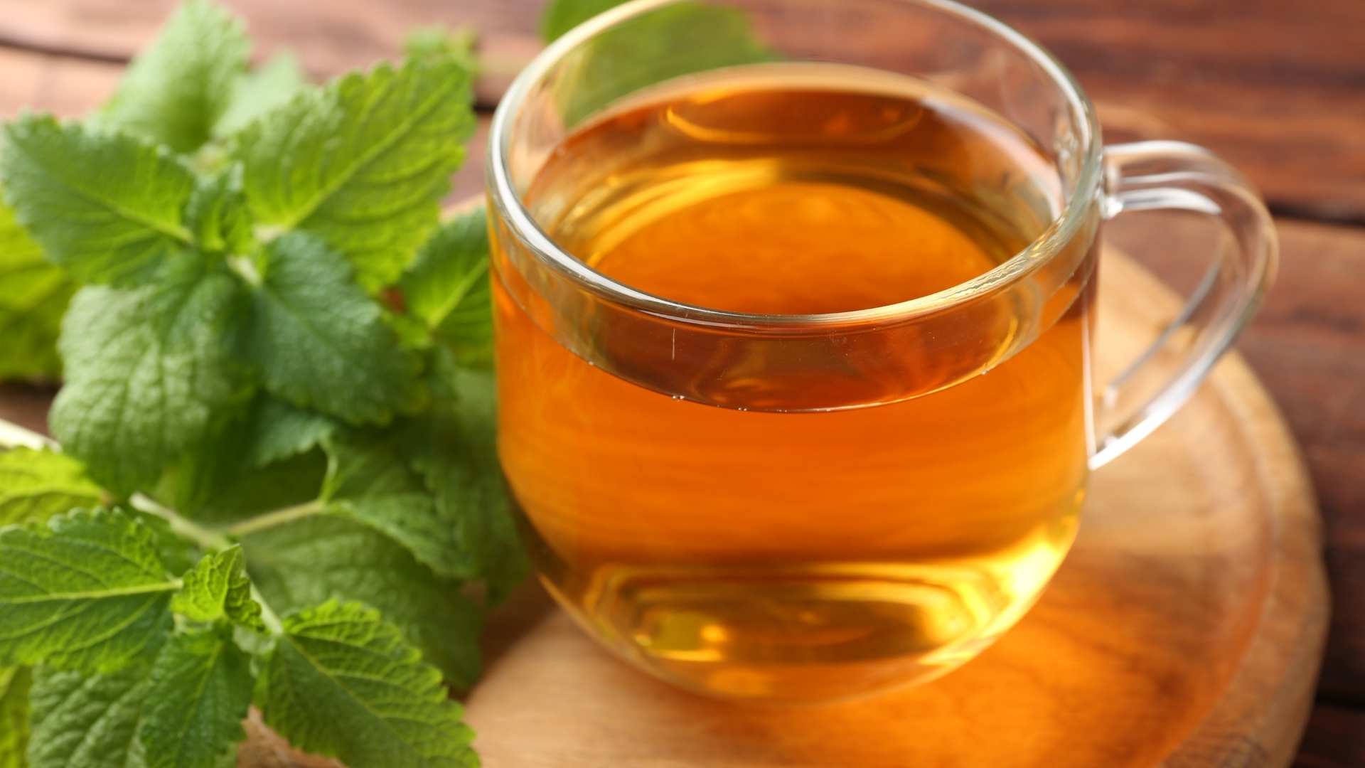 A glass of lemon balm tea