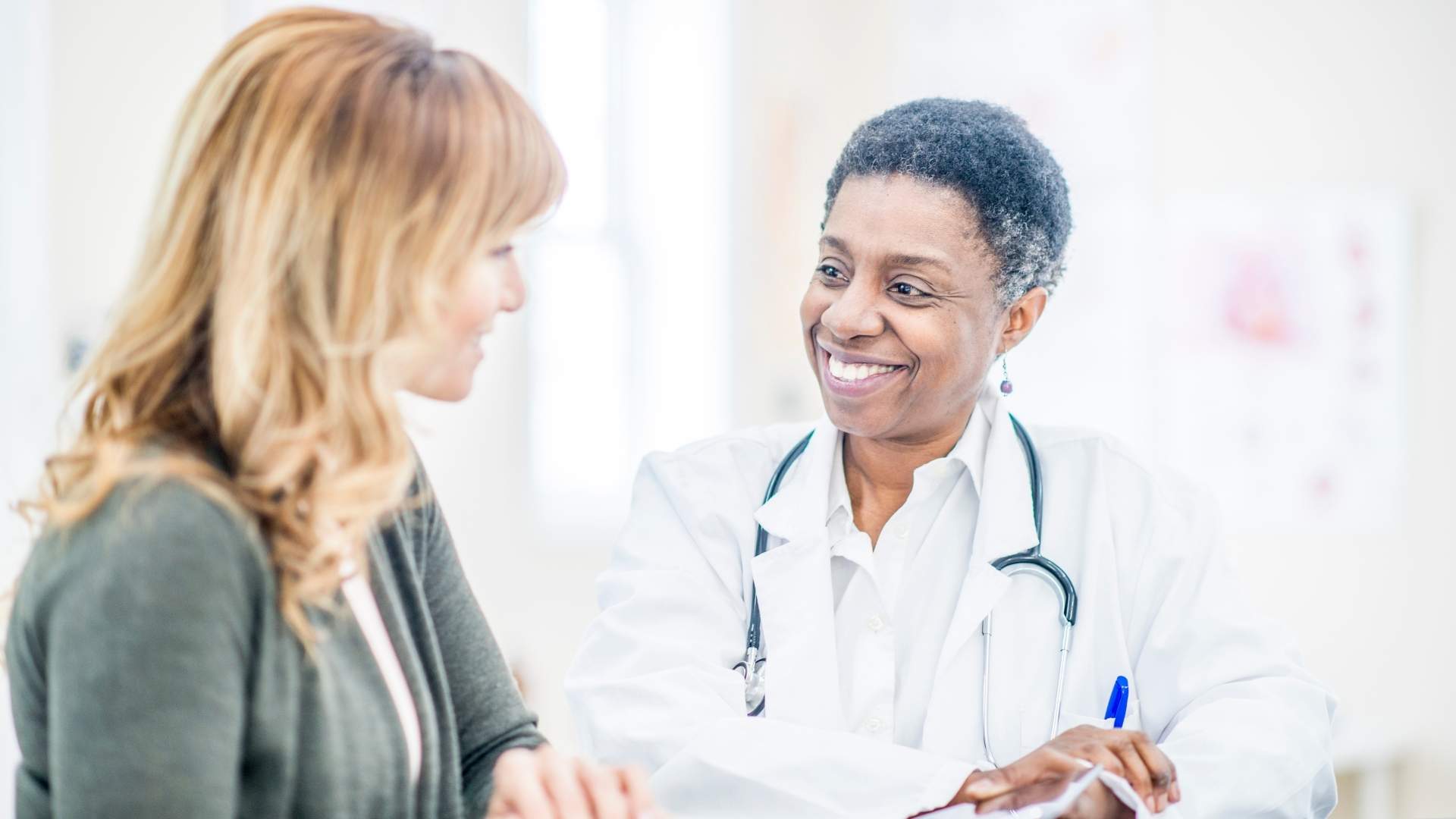 A doctor treats a patient