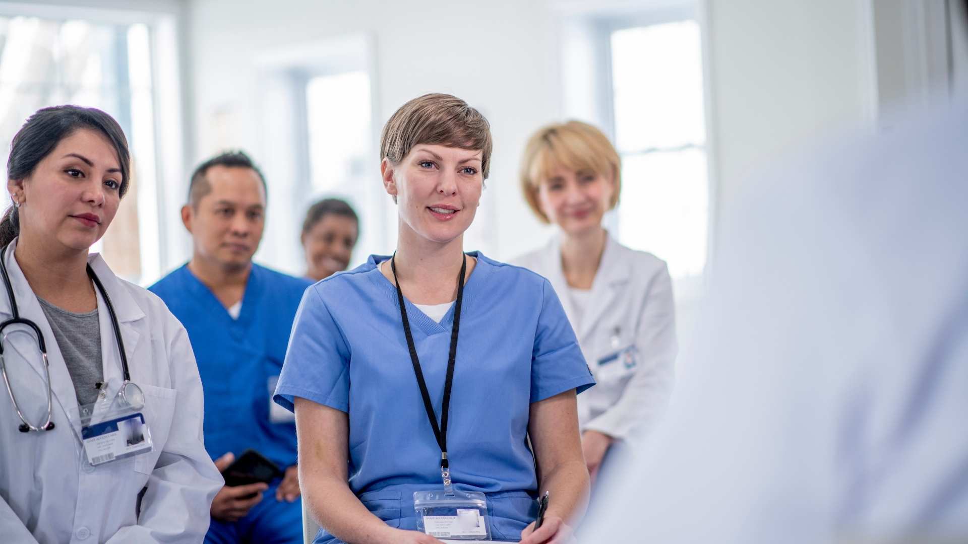 A group of doctors receive training