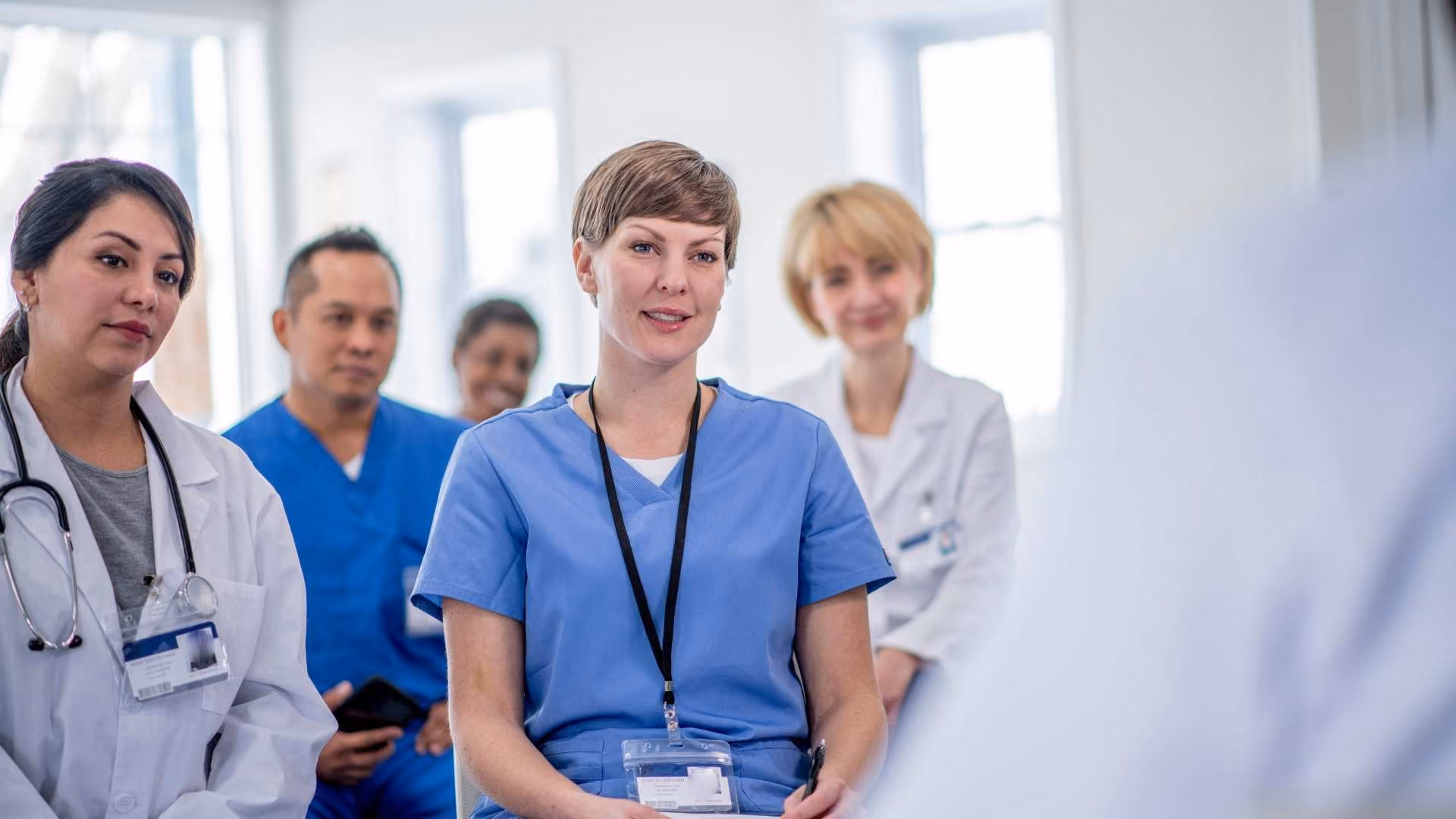 A group of doctors receive training