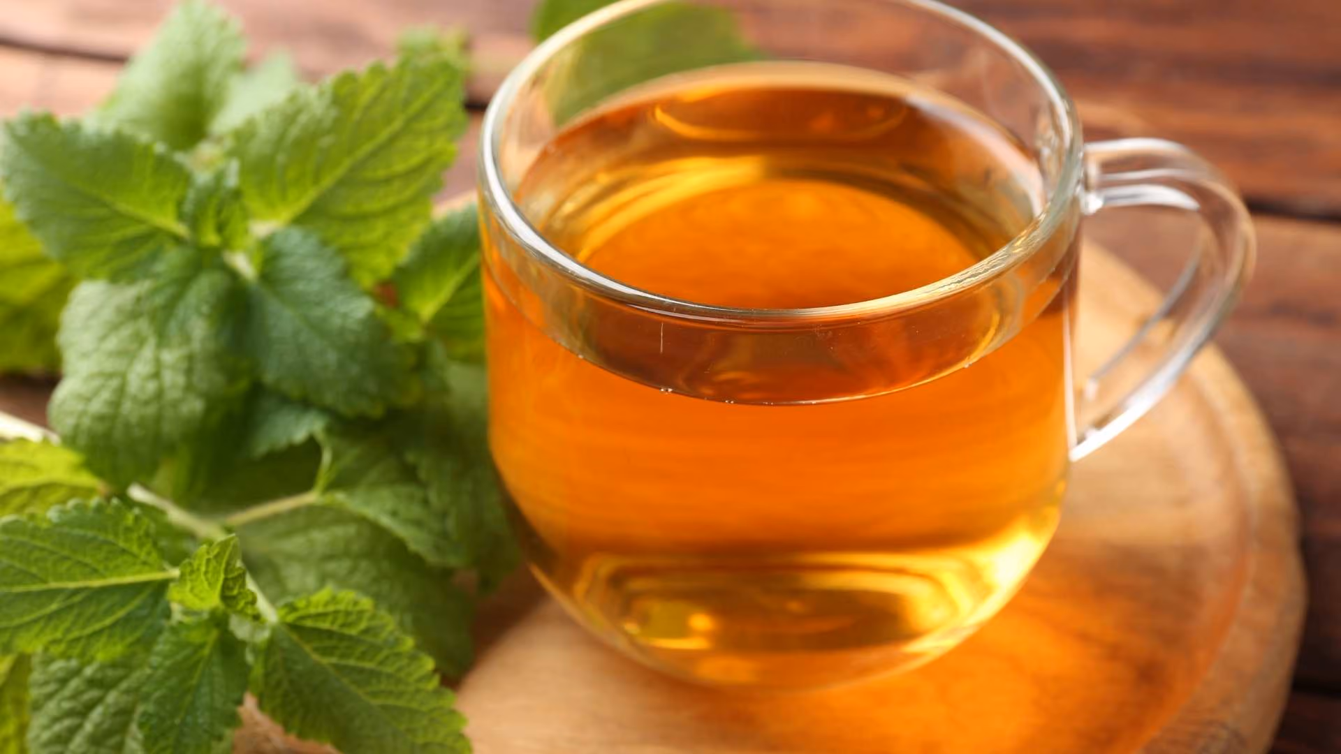 A glass of lemon balm tea