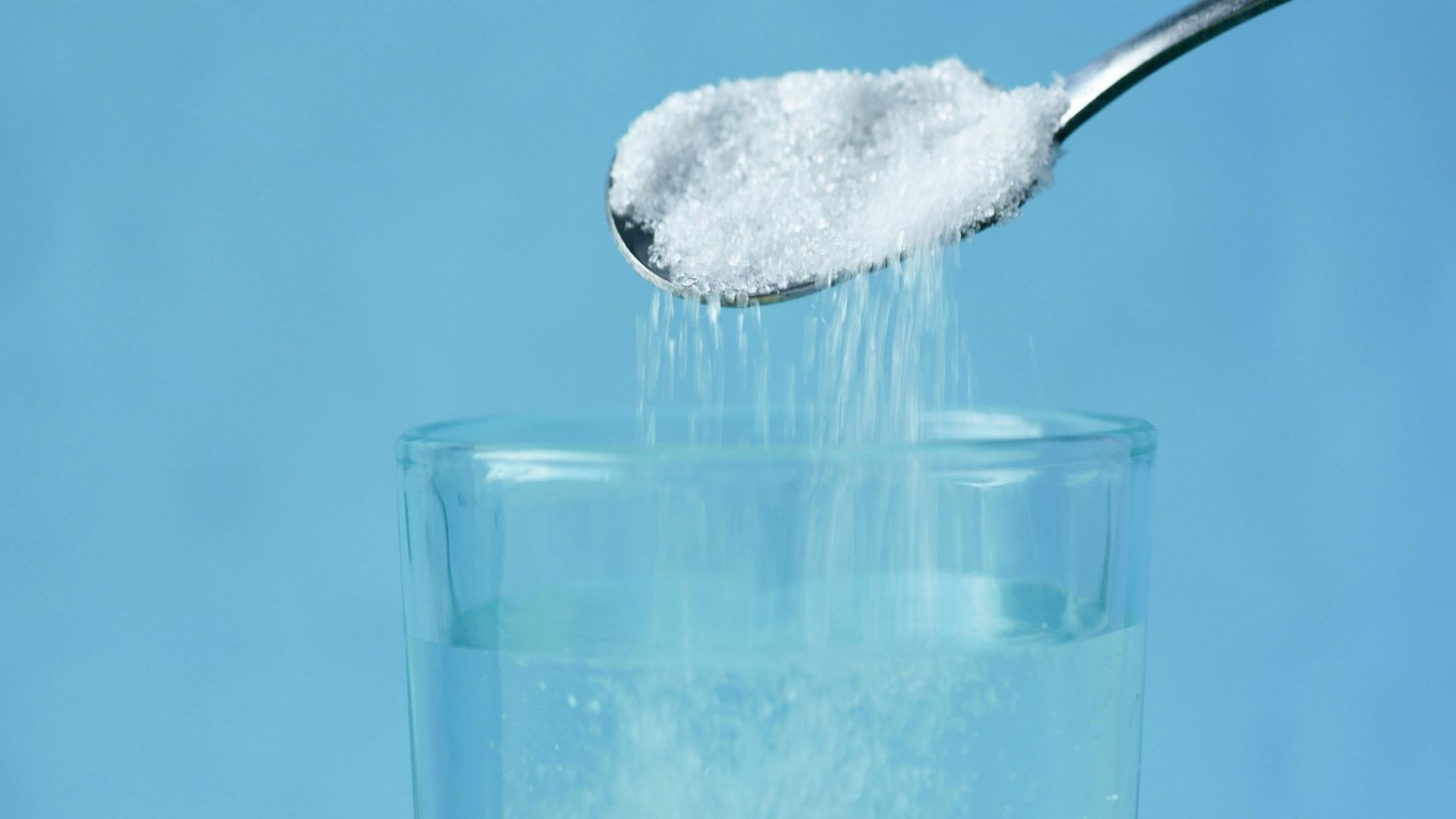 someone puts salt into water