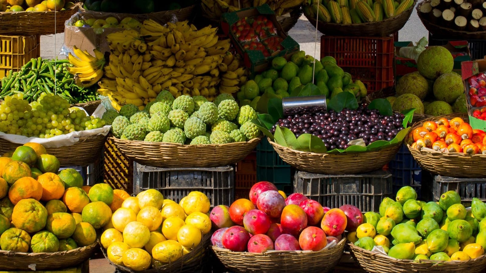 A range of exotic fruit can be seen in a market stall