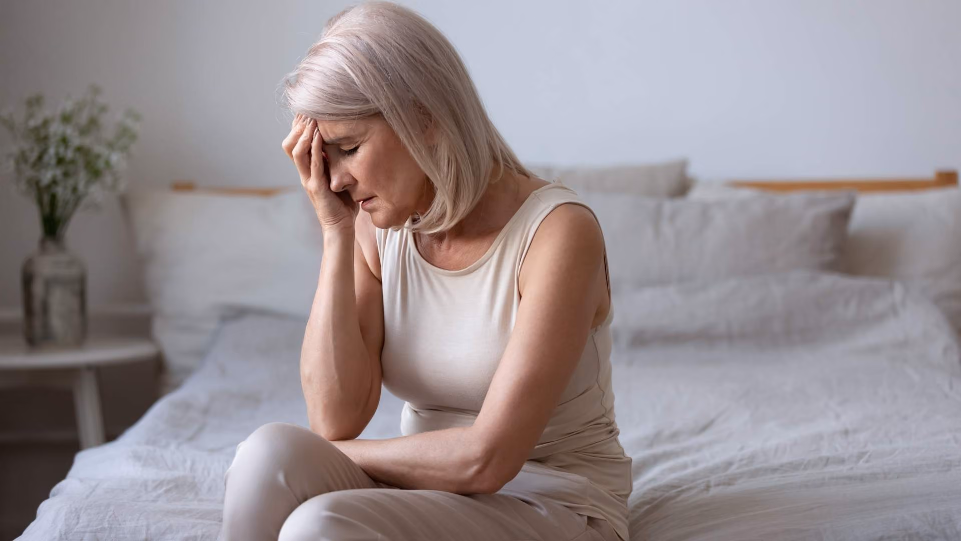 A women experience the menopause struggles with pain