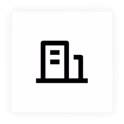 Simple black icon of a building with two horizontal windows and an adjacent smaller structure.