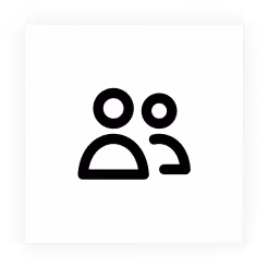 Icon of two user silhouettes side by side representing group or users.