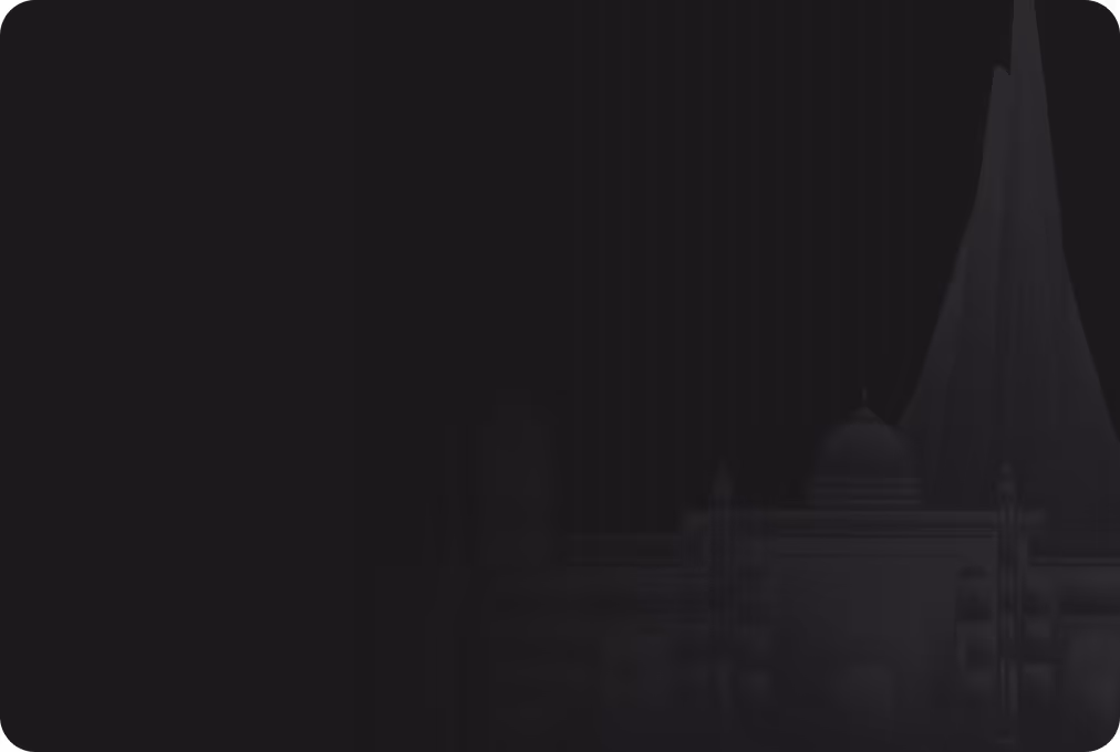 Silhouette of the National Martyrs' Memorial and Lalbagh Fort in Bangladesh against a dark background.