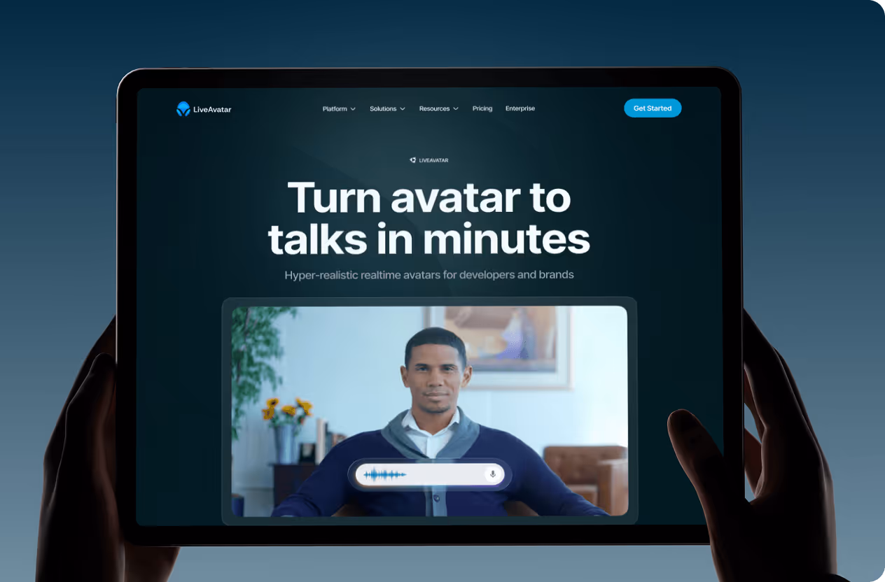 Tablet showing LiveAvatar website with a man’s realistic avatar ready to talk in a home setting by Wavespace.