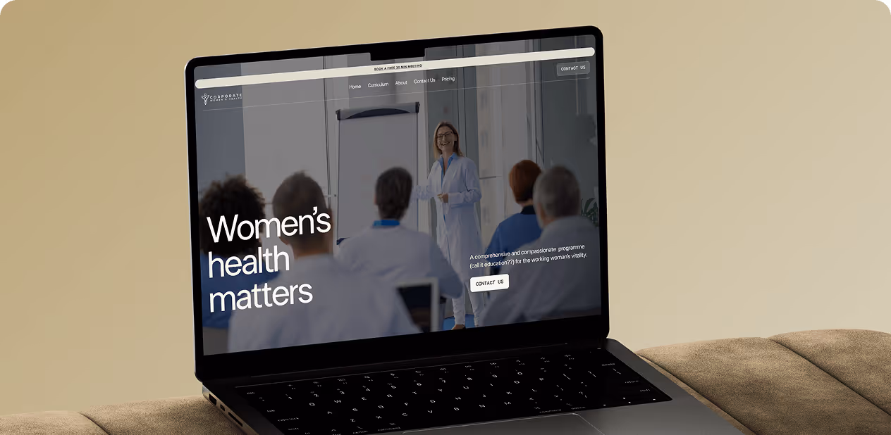 Laptop screen showing a website on women's health with a woman presenting to a seated audience by Wavespace.