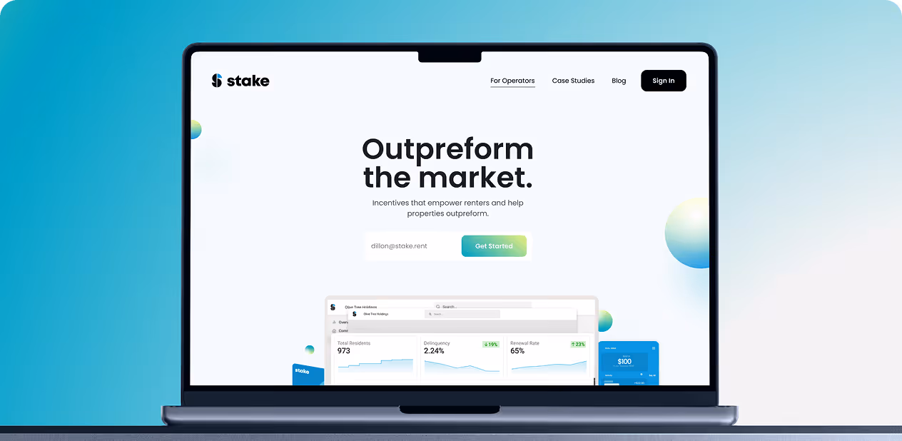 Laptop screen showing Stake webpage with text 'Outpreform the market' and a signup email field by Wavespace.