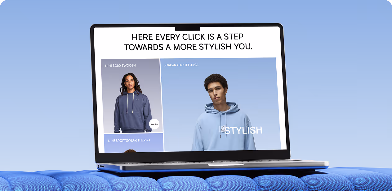 Laptop on blue cushion showing stylish hoodies and slogan about clicking towards a more stylish you by wavespace.