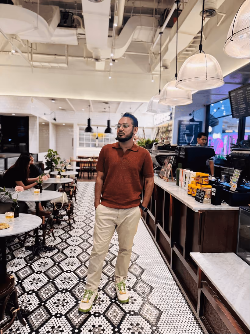 Standing inside a bright creative workspace