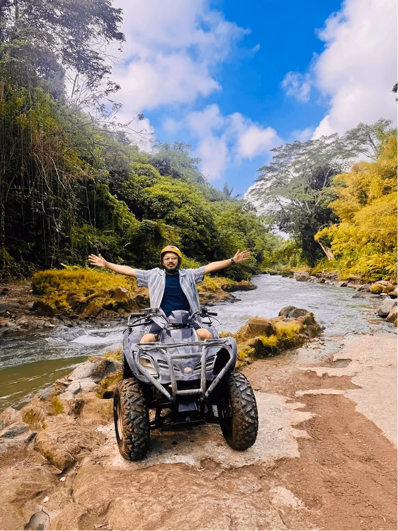 Riding an atv through a scenic outdoor trail