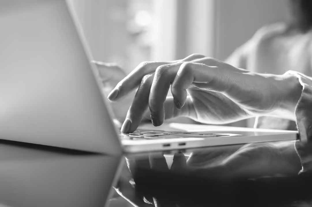 Person typing on laptop