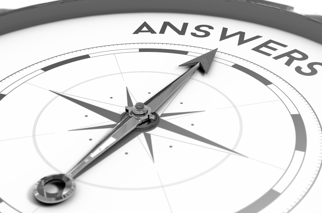 A needle on a compass points to the word ANSWERS.
