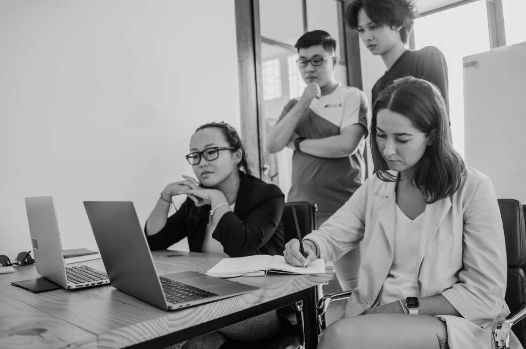 Team collaborating during a website migration planning meeting.