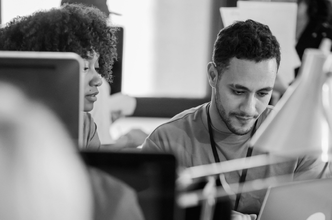 Team collaborating on a CMS migration project from AEM to Webflow.