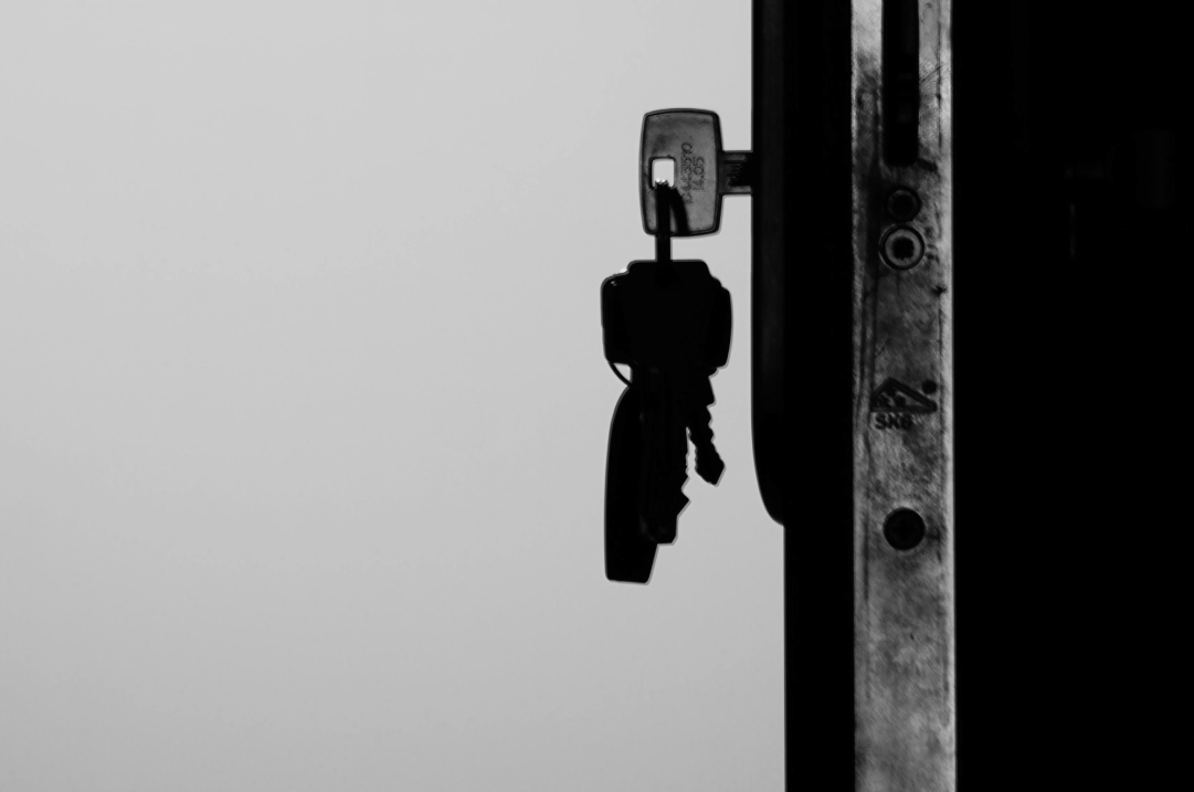 A key is inserted into a lock.