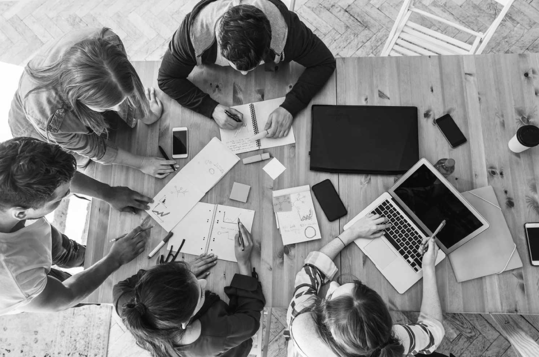 Team collaborating on B2B tech brand strategy.