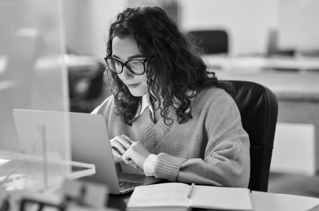 User evaluating a website on a laptop.