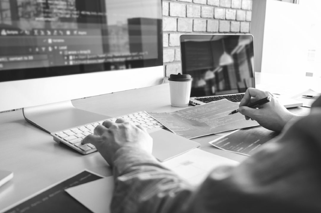 B2B web designer reviewing website code and UX to improve conversions