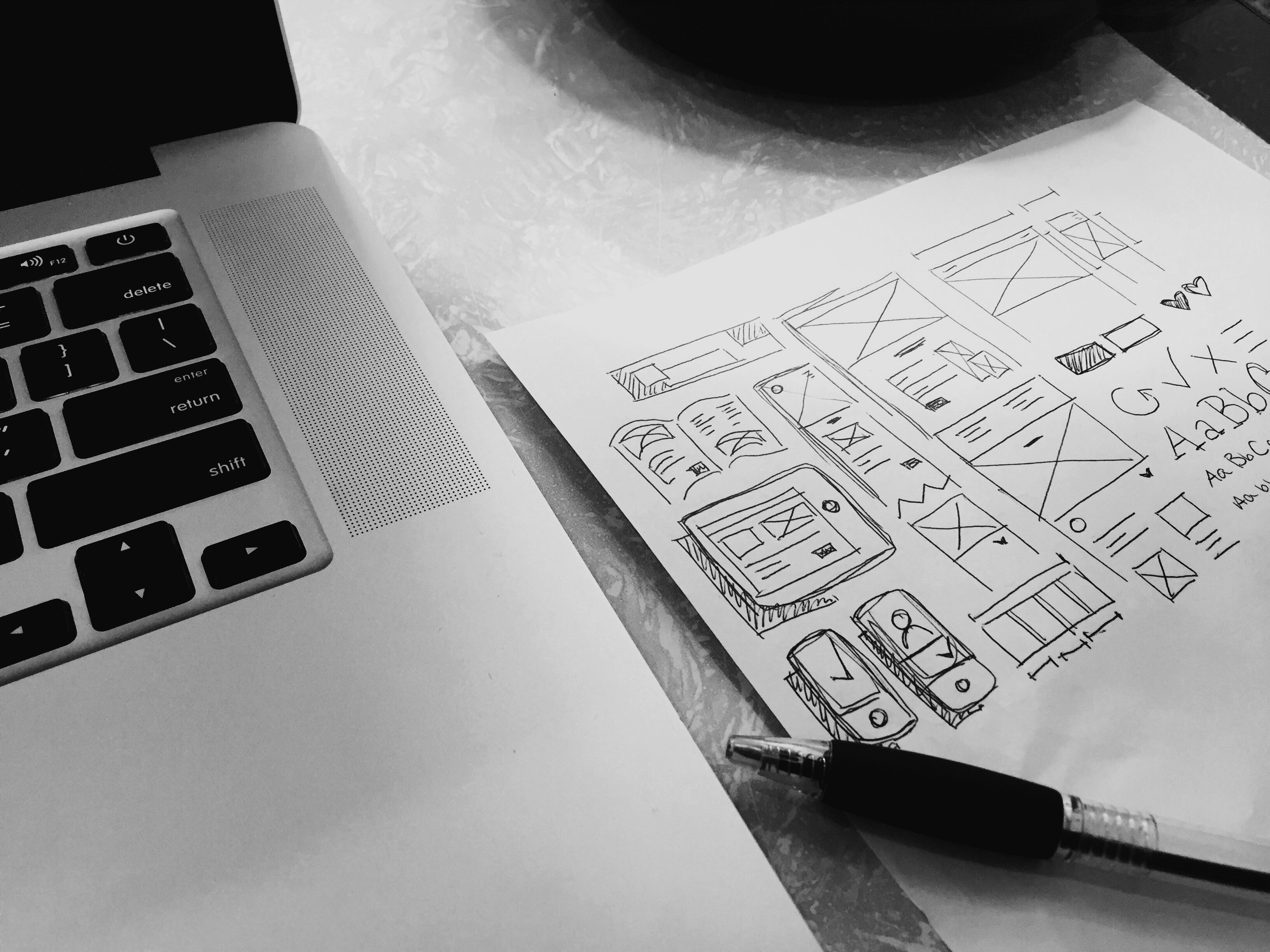B2B website redesign process starting with hand-drawn wireframes and layout architecture sketches.