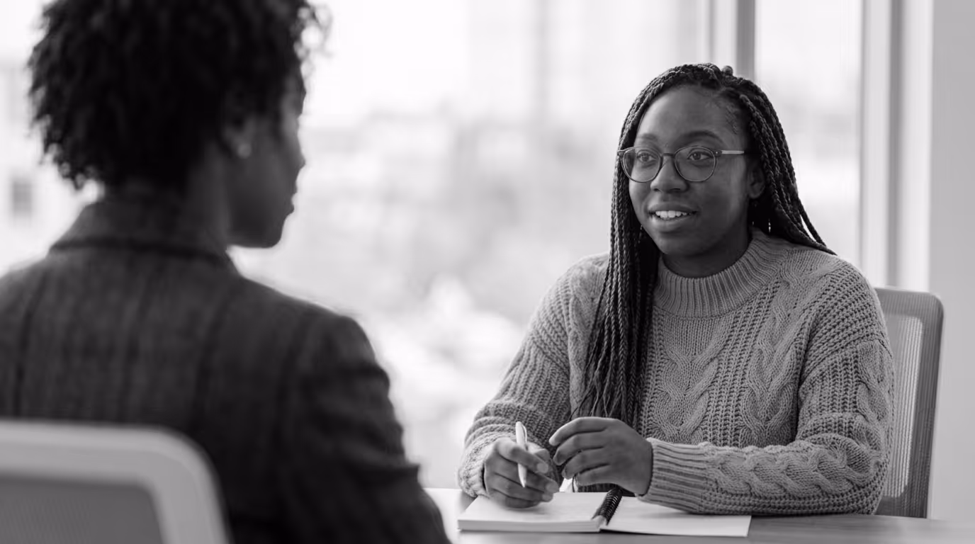 SaaS development process discovery phase — team conducting user interview before development.