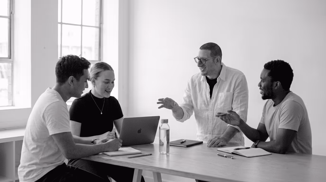 B2B team evaluating a SaaS app development company in a collaborative meeting.