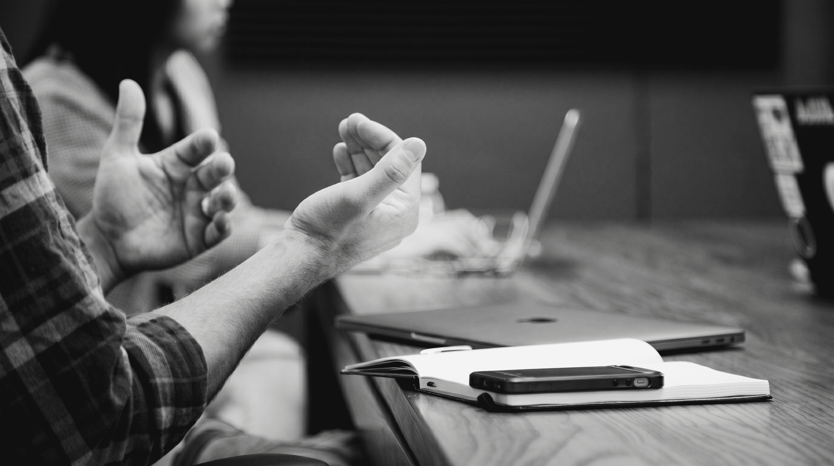 B2B professional presenting demand generation strategy in a team meeting.