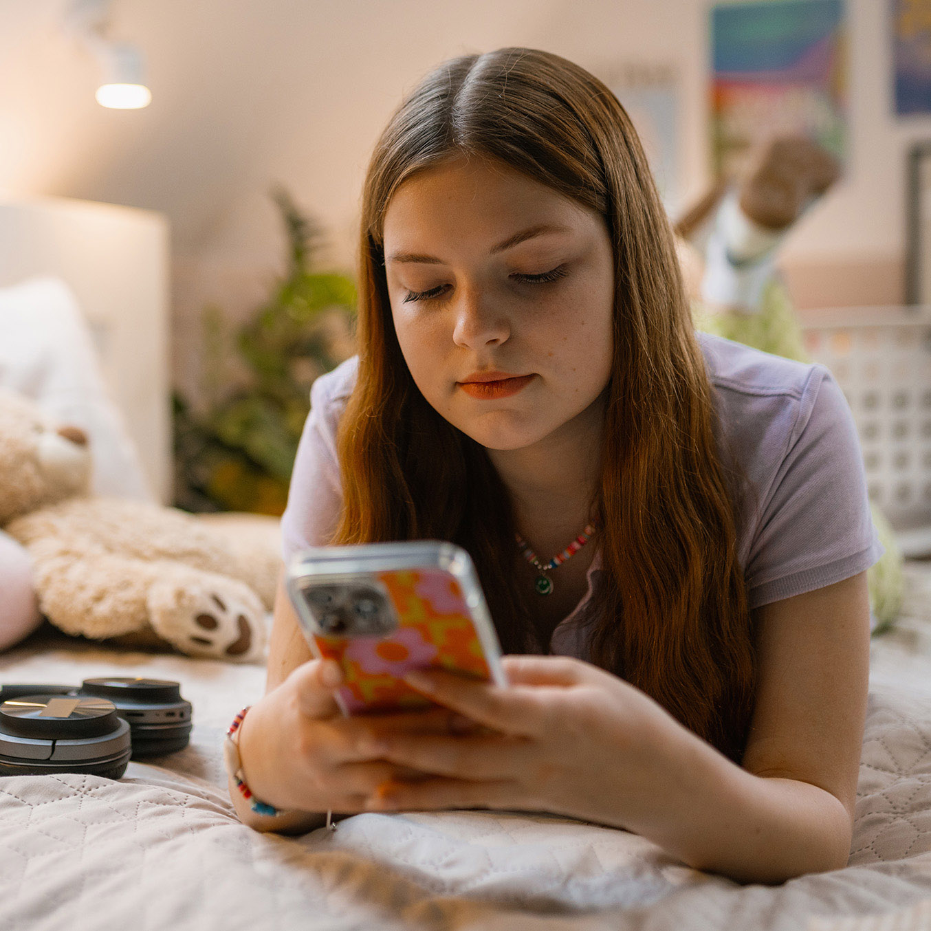 A teenager on her phone