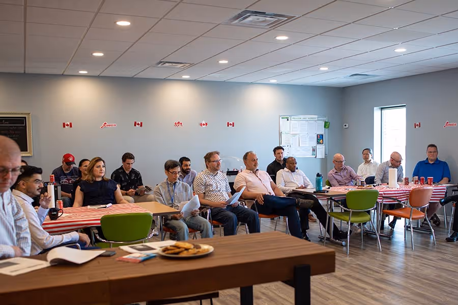 team meeting together in room