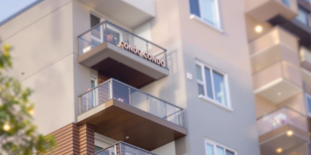 Close-up of a modern condo building exterior.