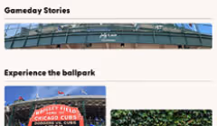 Exterior view of a baseball stadium with seating and a scoreboard under a blue sky.