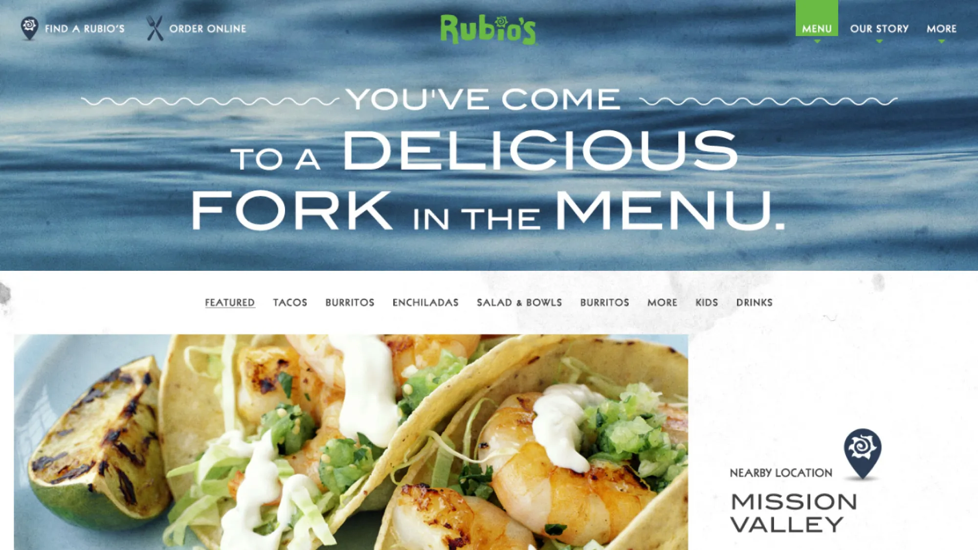 Website header with a blue water background and text saying 'You've come to a delicious fork in the menu.' showing grilled shrimp tacos and a grilled lime wedge on a plate.