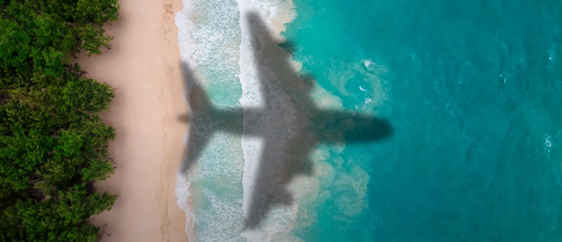 playa-de-tulum-con-sombra-de-avion