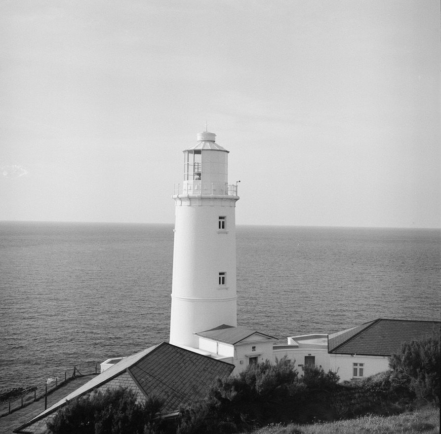 Lighthouse on the coast, black and white photograph