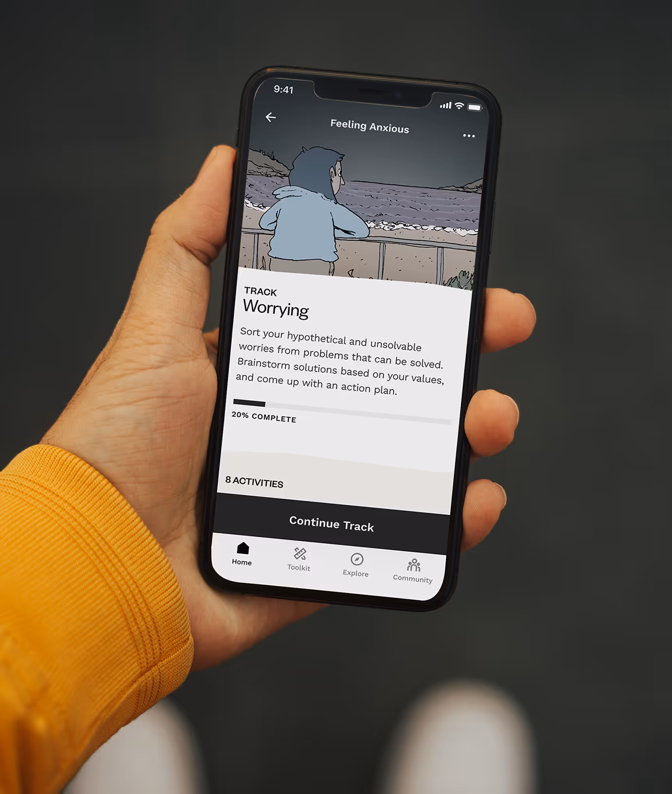 Person holding iphone with MOST app on phone.