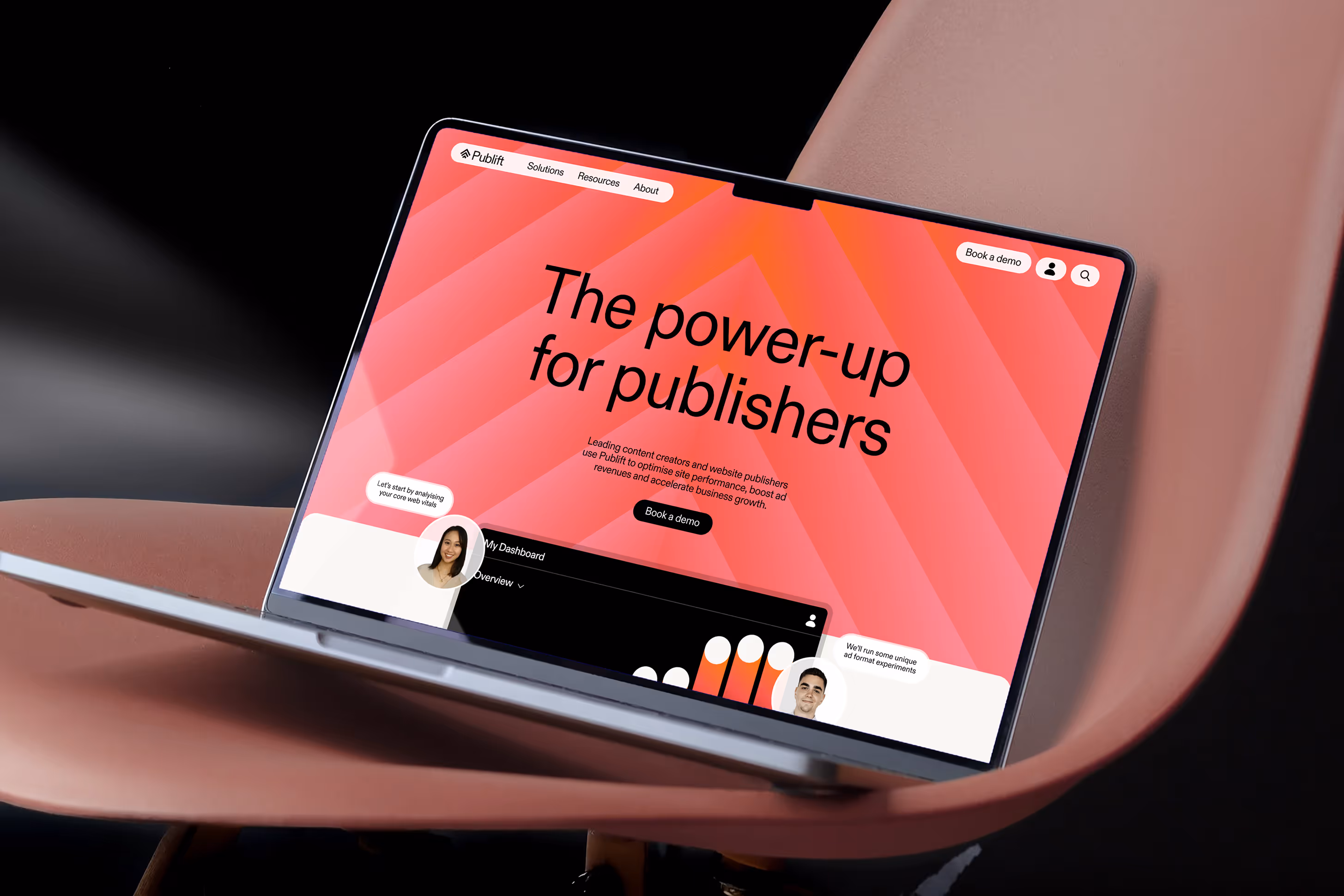A laptop rests on chair with the publift landing page on it