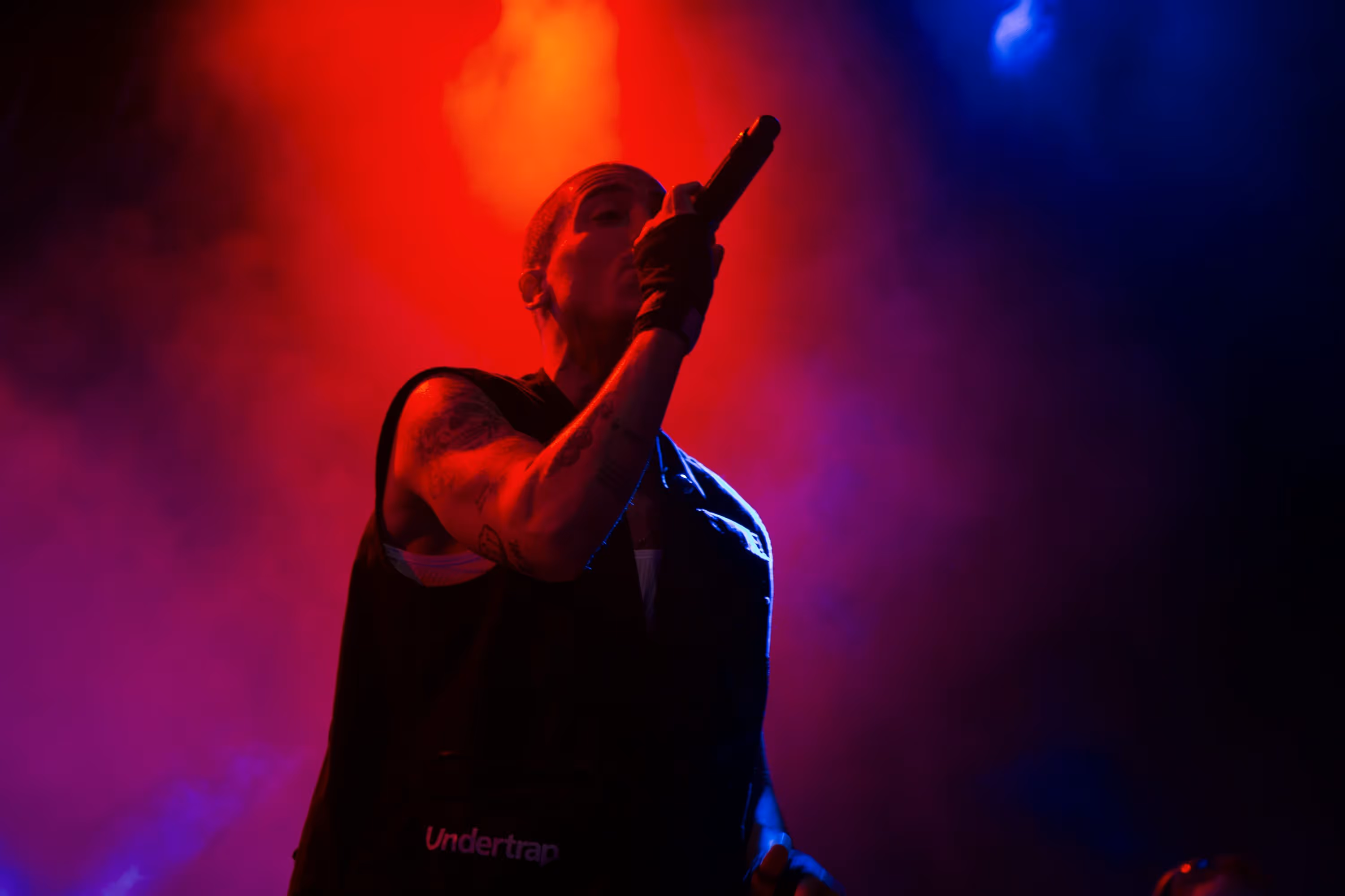 singing man under red light