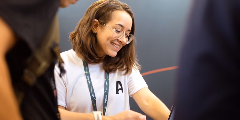 An Algrano employee at the brand booth at World of Coffee