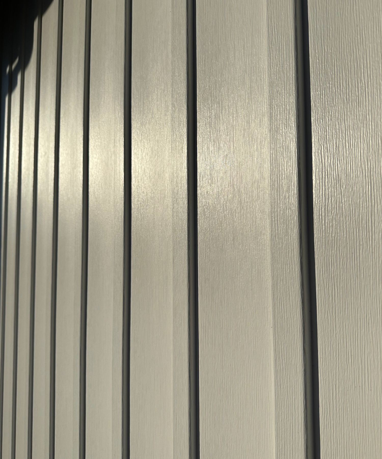 Revêtement de vinyle de type board and batten