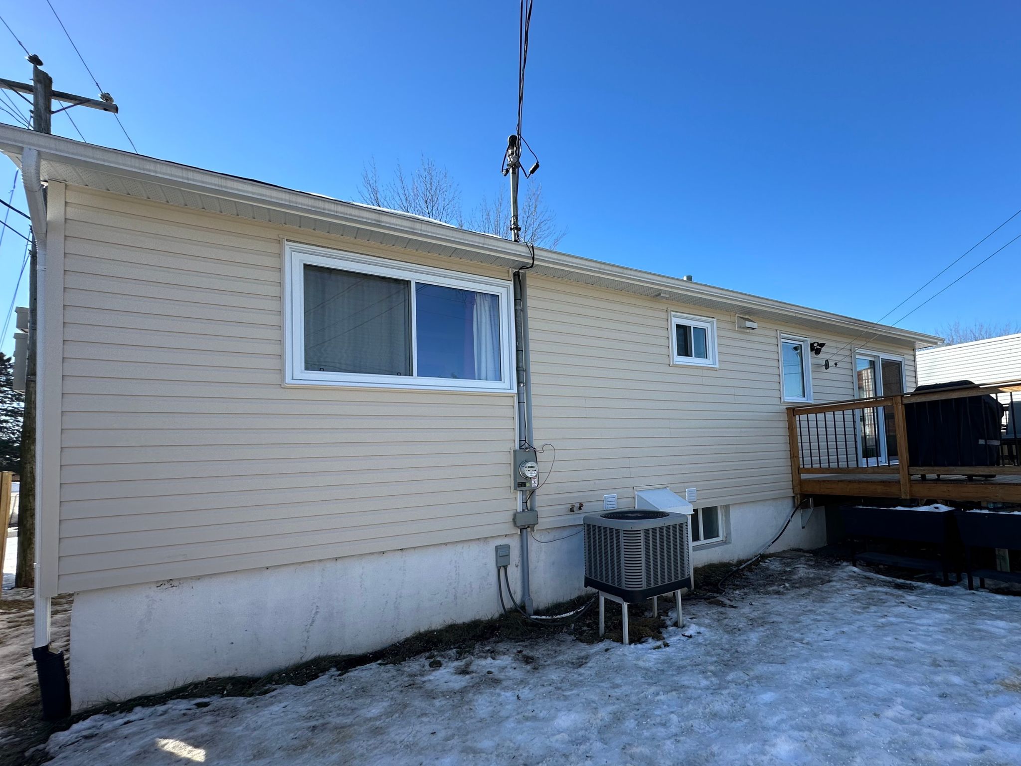 Revêtement de vinyle Gentek Driftwood sur une maison