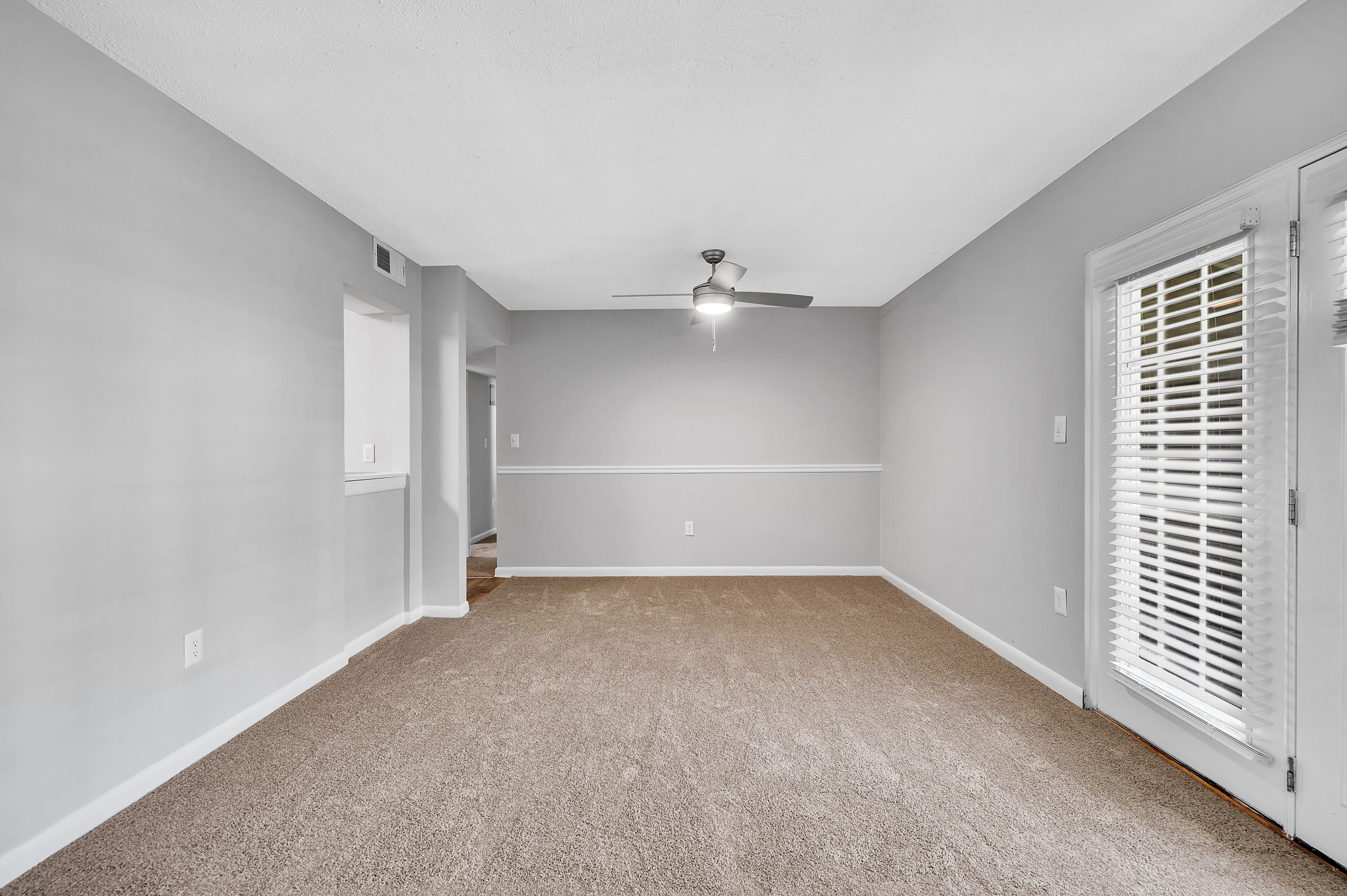 Empty room with carpet floor