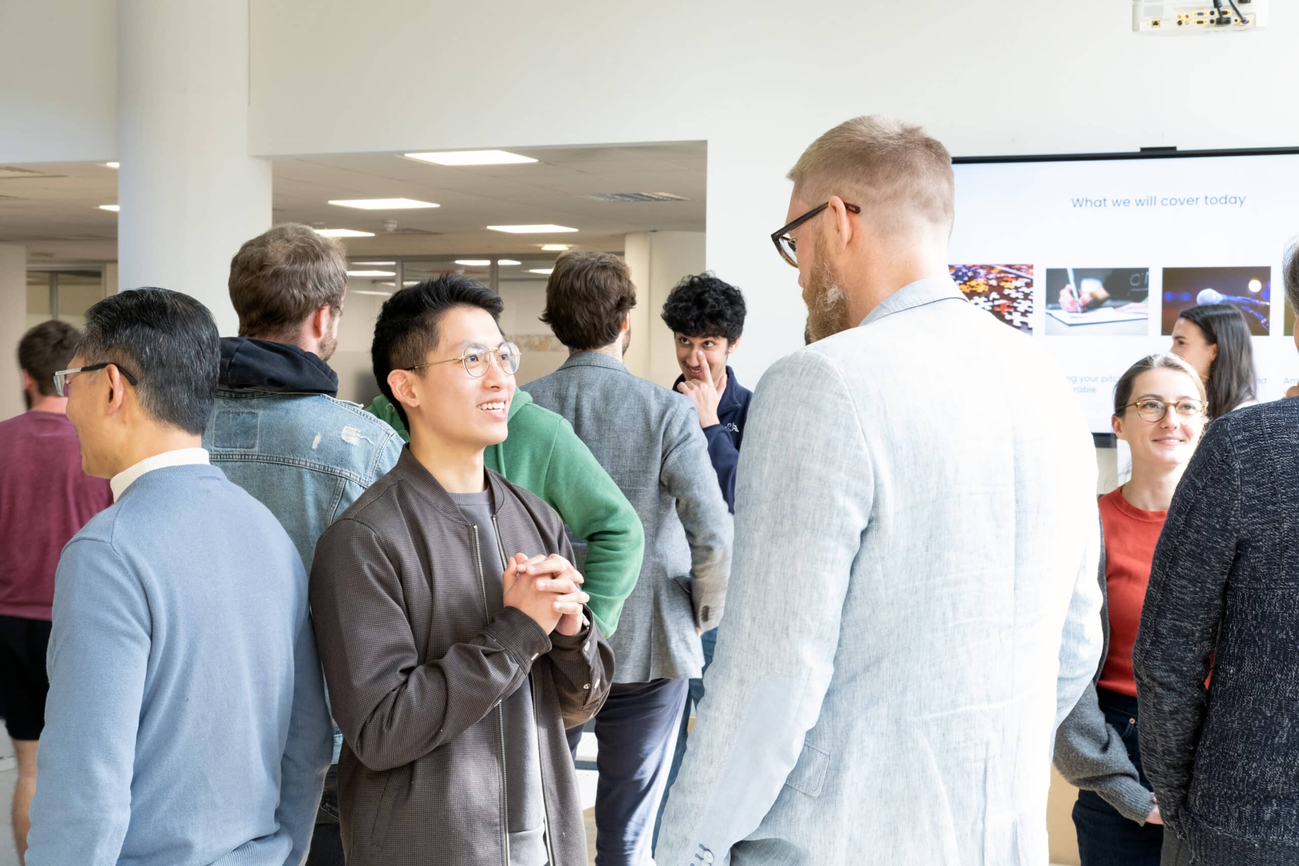 Two people collaborating at the CRL Accelerator bootcamp 2023